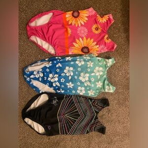 GK Elite Gymnastics leotards Sizes Adult XS and S